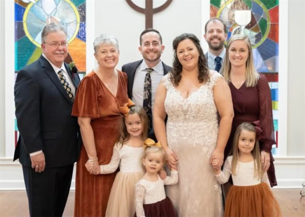 Bob Wiborg, Customer Service Representative, left, with his family. From left to right, wife Gina, son-in-law Larry, daughter Erica, son Chris, and daughter-in-law Callie. Front left to right, granddaughters Delaney, Berkley and Landry.